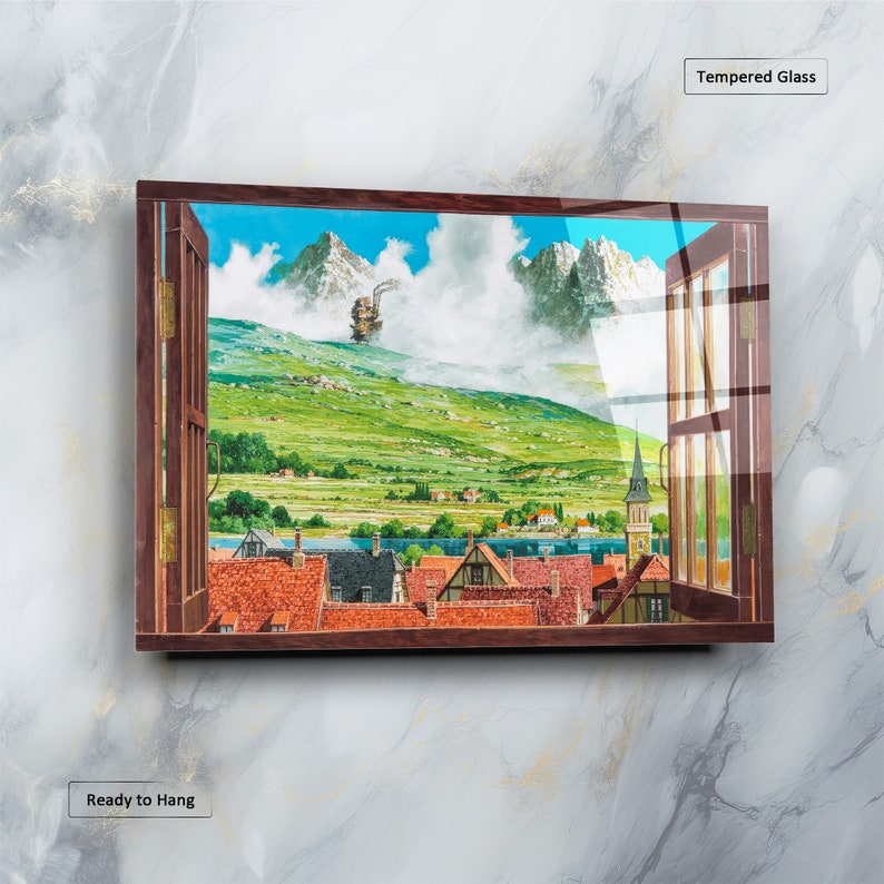 May include: A framed print of a painting depicting a small town nestled in a valley with a large mountain in the background. The painting is framed in a dark wood frame and has a glass front. The painting is titled "Tempered Glass" and is ready to hang.