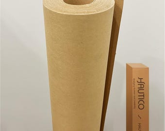 May include: A large roll of kraft paper, ideal for art projects or packaging. The paper is a warm brown color and is tightly rolled. A rectangular box with the text "HAUTICO" is visible.