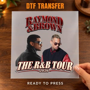 May include: A DTF transfer sheet featuring the text RAYMOND & BROWN in red and black, followed by a graphic of two men wearing sunglasses, and the text THE R&B TOUR 2026 in a red and white font. The sheet is labeled READY TO PRESS.
