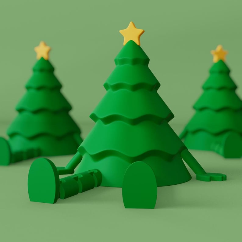 Puede incluir: Figuras de &aacute;rboles de Navidad verdes con estrellas amarillas en la parte superior. Los &aacute;rboles tienen brazos y piernas, lo que les da una apariencia caprichosa y de dibujos animados. El fondo es de color verde liso, creando una escena cohesiva y festiva.