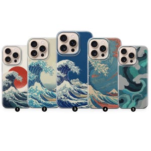 May include: Five phone cases with a Japanese wave design. The cases feature a variety of colors, including blue, white, red, and teal. The designs depict ocean waves and a red sun. The cases are numbered 1 through 5.