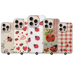 May include: Five phone cases with various designs. The cases feature ladybugs, hearts, and floral patterns in red, white, and beige. The cases are designed to fit a smartphone.