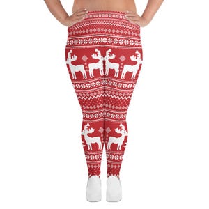 May include: Red and white Christmas leggings with a reindeer pattern. The leggings are made of a soft, stretchy fabric and are perfect for the holiday season.