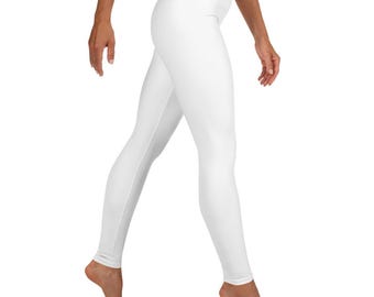 May include: White leggings made of a stretchy fabric. The leggings are form-fitting and have a high waist.