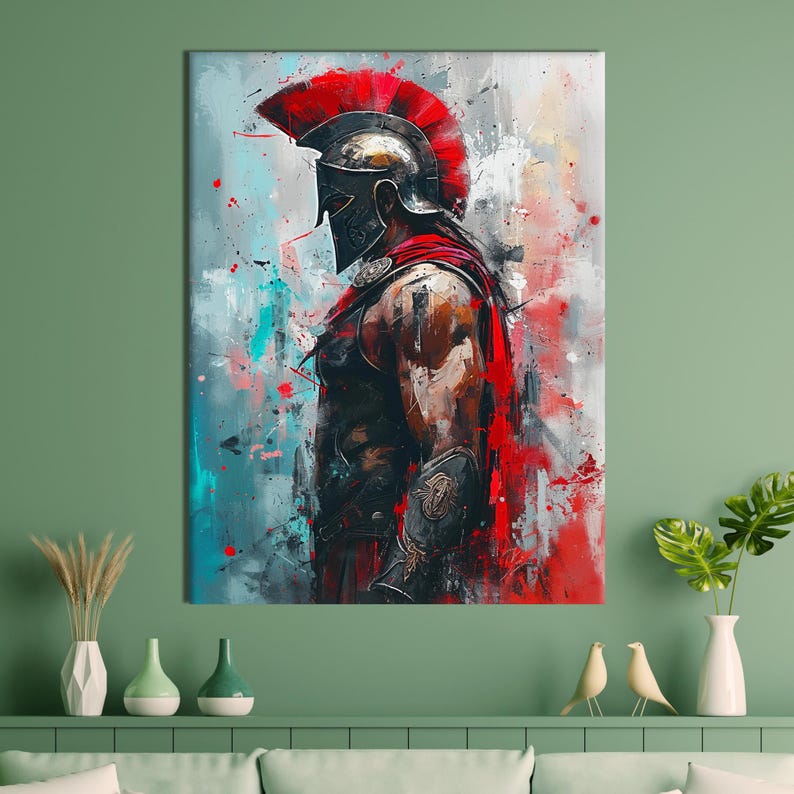 May include: Abstract art print of a Spartan warrior in profile. The artwork features a red plumed helmet, a red cape, and armor. The background has splashes of red, blue, and white paint, creating a dynamic and powerful image.