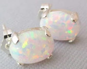 Sterling Silver Oval Fire Opal Stud Earrings: Lab-Created Sparkle