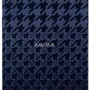 May include: A rectangular rug with a repeating houndstooth pattern in shades of navy and blue. The design features a gradient effect, transitioning from lighter to darker hues. The text "KAMTA ©" is visible.