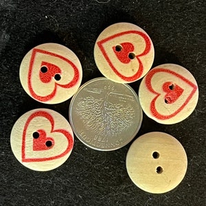 5 wood buttons with a red printed heart within a heart