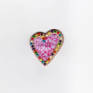 small heart iron on applique. Gold, dotted boarder.