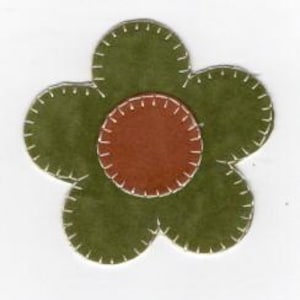 May include: A handmade felt flower with a dark olive green petal design and a brown center. The edges are stitched with white thread, creating a textured appearance. The flower is a simple, yet charming craft item.
