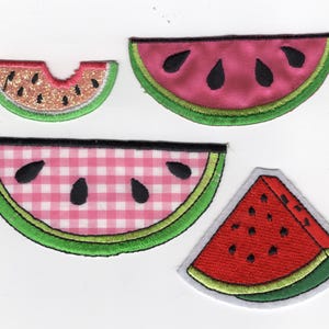 May include: Four embroidered watermelon patches in various designs. One patch has a bite taken out, another has a pink and white gingham pattern, and the others are solid pink and red. All have green rind and black seeds.