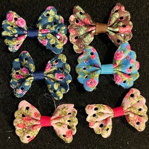 6 small floral print ribbon bows. New. 1.5&quot;