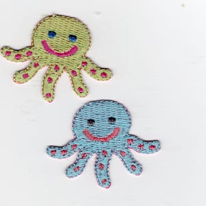 2 cute octopus. Iron on patches. Blue and yellow.