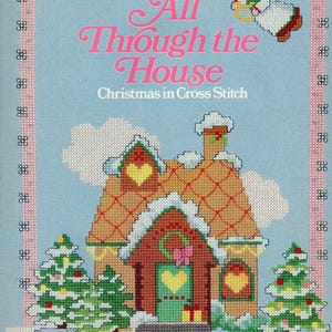 May include: A cross-stitch pattern book titled "All Through the House" with a Christmas theme. The cover features a stitched illustration of a gingerbread house with snow, Christmas trees, and an angel. The text "Christmas in Cross Stitch" is also visible.
