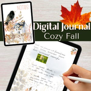 May include: A digital journal with the text "Digital Journal Cozy Fall." The journal displays a watercolor illustration of a bird on a branch and a house. A hand is using a stylus to write on the journal page.