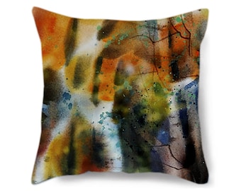 Può includere: Cuscino quadrato con un design astratto ad acquerello. Il cuscino presenta una miscela di colori caldi, tra cui arancione, giallo e marrone, con accenti di blu e verde. Il design ha un aspetto strutturato, che ricorda pennellate e schizzi.