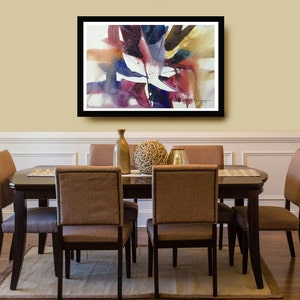 May include: A framed abstract watercolour painting with shades of purple, blue, and brown. The painting is hanging on a wall above a dining table with six chairs.
