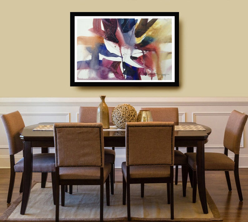 May include: A framed abstract watercolour painting with shades of purple, blue, and brown. The painting is hanging on a wall above a dining table with six chairs.