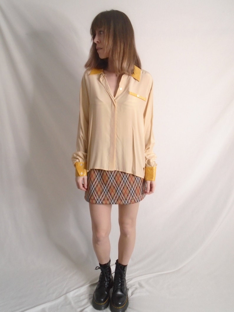yellow snakeskin top