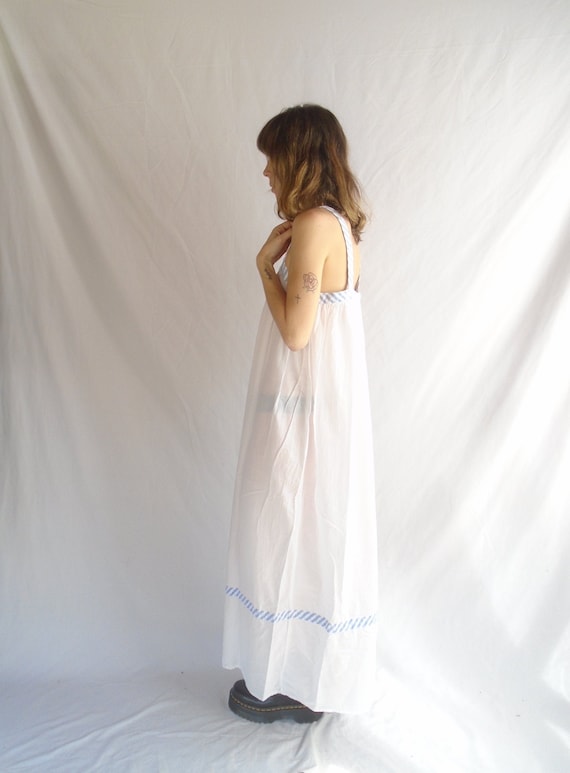 crisp white cotton maxi dress with contrast stripe