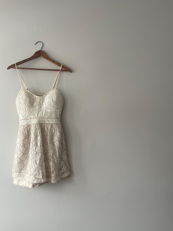 cream lace babydoll dress Lucky In Lace Tie-Back Babydoll Mini Dress