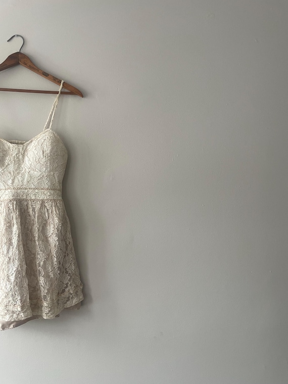knee length dresses for ladies The Peaceful Cream Textured Babydoll Dress – Shop the Mint main image 0