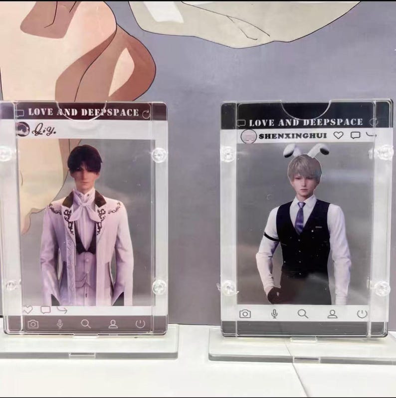 May include: Two clear acrylic photo frames with images of male figures. The frames have a social media interface design, with the text "LOVE AND DEEPSPACE" at the top. One figure wears a white suit, the other a vest and tie.