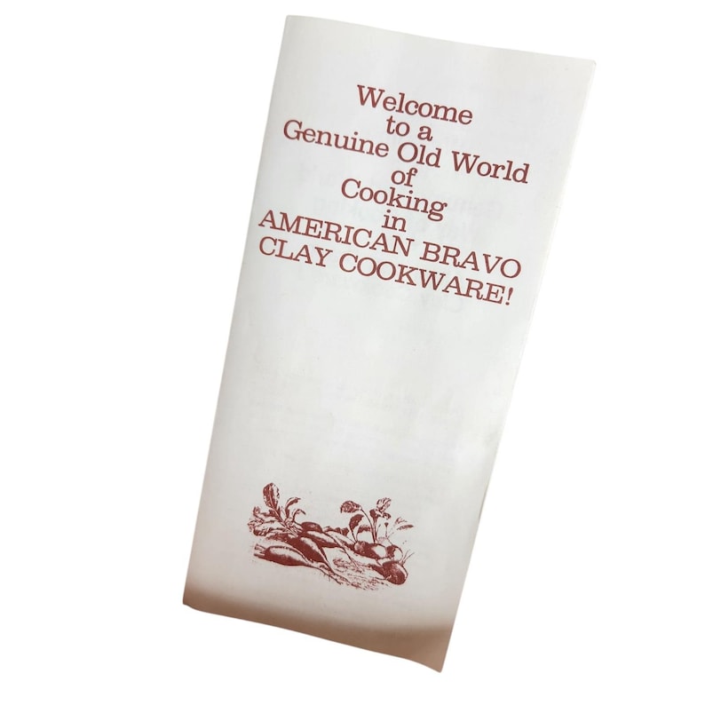 May include: A white paper with the text "Welcome to a Genuine Old World of Cooking in AMERICAN BRAVO CLAY COOKWARE!" in maroon. A maroon illustration of vegetables is at the bottom.