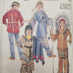 May include: A sewing pattern envelope illustration by Andrea Schewe featuring four figures wearing various garments including a red jacket with yellow accents, a blue tunic with fringe, a tan dress with fringe and a shawl, and a tan outfit with a headdress.