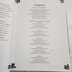 May include: A book titled "Five-Year Christmas Journal" with a red and white polka dot background. The book has a table of contents with sections for "Memories of Christmas Past" and "Five-Year Christmas Journal". The book includes sections for each year, including "Preparations for the Season", "Seasonal Fun", "Celebrating Christmas", and "Wrapping Up and Looking Ahead".