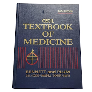 Op de afbeelding: Een marineblauw hardcover boek met de titel "CECIL TEXTBOOK OF MEDICINE" in gouden letters. De cover toont ook "20TH EDITION" en de namen "BENNETT and PLUM" in goud. Rode verticale lijnen en een gouden en rood embleem zijn ook zichtbaar.