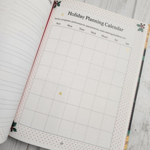 May include: A blank holiday planning calendar with a grid layout and headings for each day of the week. The calendar is decorated with red and white polka dots and a holly sprig.