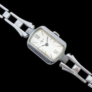 Vintage women&#39;s Luch mechanical wristwatch timepiece with classic manual wind watch