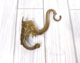 Gancho decorativo doble con cabeza de elefante de latón vintage, hecho en India, estilo bohemio, para colgar en la pared, para colgar ropa, batas y correas.