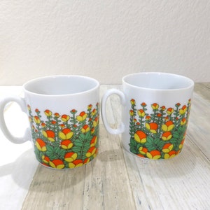 Vintage Flower Power Ceramic Coffee  or Tea Cups Set of 2 Mod Mid Century 6 Ounce Capacity Yellow Orange Flowers Green Leaves