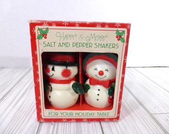 Salero y pimentero navideño vintage con diseño de muñeco de nieve y mujer de nieve de Hallmark
