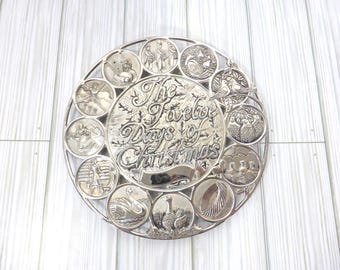 Salvamanteles redondo vintage de plata internacional con motivo de los 12 días de Navidad.