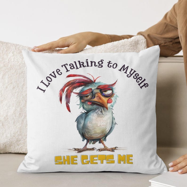 May include: White throw pillow with a cartoon bird wearing glasses and the text "I love talking to myself she gets me".