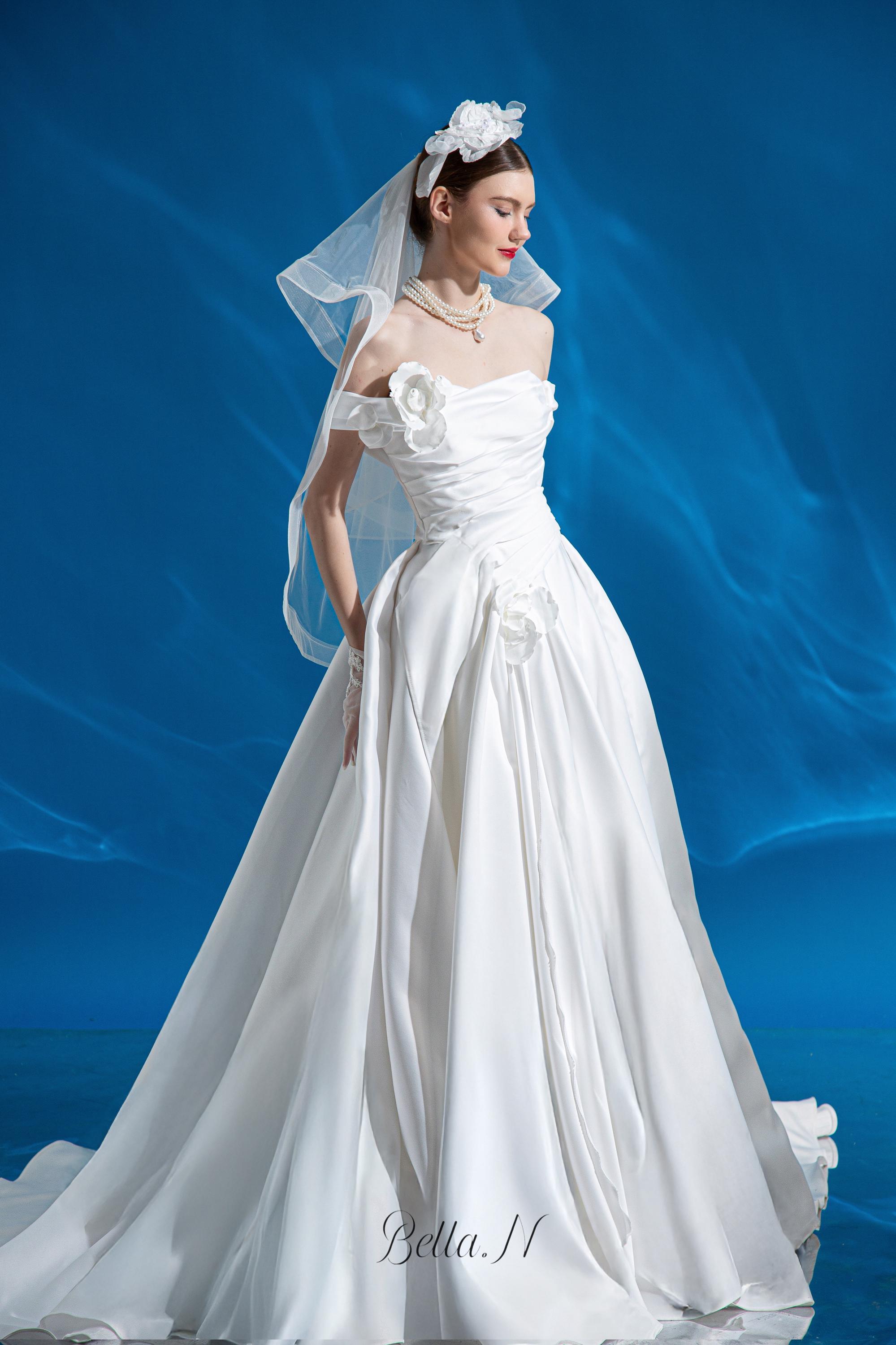 mikado off shoulder wedding dress CONICTA | A-line wedding dress in mikado off-the-shoulder