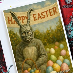 May include: A greeting card with a person in a gray bunny suit holding a basket of Easter eggs. The banner reads "HAPPY EASTER." The text at the bottom says, "WHY ARE YOU WEARING THAT STUPID MAN SUIT?"