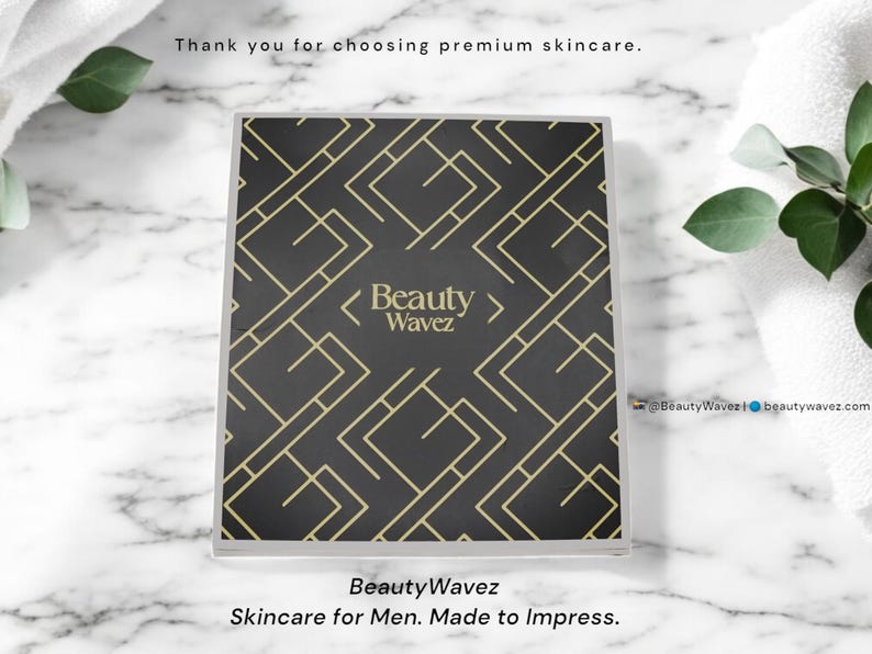 Beauty Wavez luxury skincare box flatlay with brand message “Skincare for Men. Made to Impress.” on marble background with spa towel and eucalyptus, styled for premium unboxing experience.