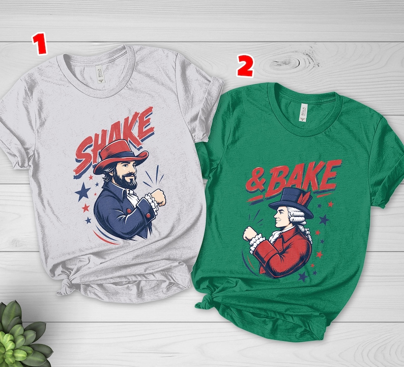 May include: A light gray t-shirt labeled 1 featuring a man in a red hat and blue coat with the text SHAKE and a green t-shirt labeled 2 featuring a man in a blue hat and red coat with the text & BAKE, both with red and blue star accents.