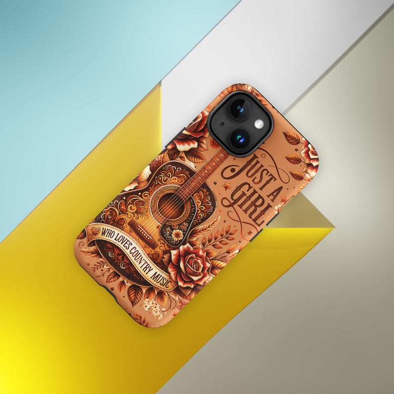 May include: A phone case featuring a detailed illustration of an acoustic guitar with floral accents and the text "Just a Girl." A banner reads "Who Loves Country Music." The case has a brown background with red roses.