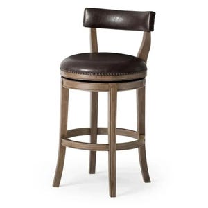 May include: A brown leather swivel bar stool with a backrest. The seat is round and has a dark brown leather cushion. The wooden frame is a light brown colour.