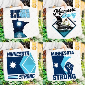 May include: White tote bags with various designs featuring the words "Minnesota Strong." Designs include a loon, a map of Minnesota, and geometric shapes, all in shades of blue and white. The bags are held up by a person.