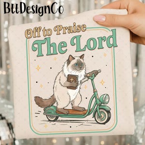 May include: A cream-colored graphic featuring a cat riding a green scooter, holding a book with a cross. The text reads "Off to Praise The Lord" in a retro font. The design includes gold stars and a light green border.