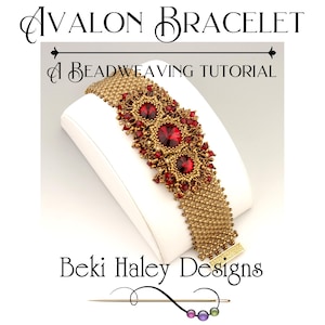May include: A gold-coloured beaded bracelet featuring three large, round, red gemstones. The bracelet is displayed on a white surface. The text "Avalon Bracelet" and "A Beadweaving Tutorial" are at the top. The text "Beki Haley Designs" is at the bottom.