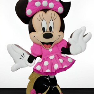 May include: A pink and white polka dot dress with a pink bow and black shoes. The character is a cartoon mouse with black ears and a black nose. The character is smiling and has large eyes. The character is a pinata.