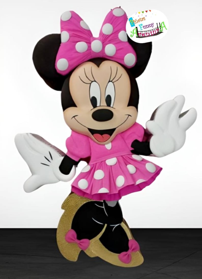 May include: A pink and white polka dot dress with a pink bow and black shoes. The character is a cartoon mouse with black ears and a black nose. The character is smiling and has large eyes. The character is a pinata.