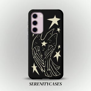 May include: A black phone case featuring a white line art illustration of a bird with skeletal wing details surrounded by various sized stars. The text SERENITYCASES is printed in black at the bottom center of the image below the phone case.